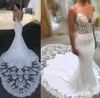 Yeni Arapça Ucuz Mermaid Gelinlik Spagetti Sapanlar Dantel Aplikler Illusion Saten Kolsuz Şapel Tren Backless Örgün Gelinlikler