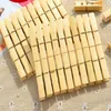 60 pçs / lote Frete grátis 6 * 1.2 cm Pegs Meias De Madeira De Bambu Meias Lençol Toalha À Prova de Vento Clipes Grampos Household Clothespins