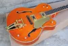 Orange semihollow electric guitar with gold pickup rosewood scale vibrato system customized service9456701