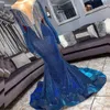 輝くタッセルの長袖の人魚のイブニングガウン2K19カクテルの正式なパーティードレスを持つロイヤルブルーのスパンコールのドレス