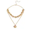 gold puka shell necklace