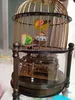 Orologio da tavolo meccanico in ottone con gabbia per uccelli raro