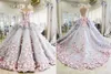 2022 Luxury Ball Gown Wedding Dresses Lace 3D Floral Appliques Cap Sleeves Sweet 16 Sweep Train Sheer Back Puffy Party Formella Bröllopsklänningar