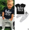 Baby flicka kläder pojke blommiga toppar byxor kostymer tecknad randig kläder uppsättningar camo brev djur utskrift t-shirt byxor outfits 23 stil dhl 5387