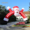 Outdoor Christmas Dekoracyjne Nadmuchiwane Santa Arch 6m / 8m / 10m Wesołych Świąt Drzwi z niestandardowym Drukowanie do dekoracji wejściowej