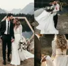 Abiti da sposa bohémien su misura 2019 Abito da sposa in due pezzi in chiffon da spiaggia con maniche lunghe in pizzo Abito da sposa Boho con collo gioiello