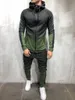 Nuova tuta da uomo con cerniera Set sportivo 2 pezzi Tuta Abbigliamento casual Bodybuilding Felpe con cappuccio giacca Tute da uomo Pantaloni