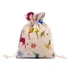 10 * 14cm Linho Natal Cotton presentes papel de embrulho Cosméticos Jóias Embalagem Sacos com cordão Bag Purse Bag yq00781