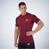 ファッションクイックドライラスガードジムTシャツスポーツシャツ男性半袖ランニングシャツ圧縮フィットネスボディービルディングトップスティー