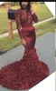 Sexy Burgundy Mermaid Prom Dresses 3D Floral Rose Flowers Lace Appliques Beaded Long Sleeves Open Back Sweep Train Party Evening Gowns