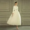 Vintage 50s tutu vestido de casamento 34 mangas fantasia tule chá comprimento curto vestidos de noiva personalizado plus size 20206749269