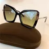 Yeni yüksek kaliteli kadın güneş gözlükleri popüler moda kedi göz güneş gözlüğü gafas de sol mujer orijinal ambalaj kılıfı 0766 UV koruma sun251l