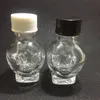 クールなPyrex Skull Glass Storage Jarボトルシールカバーコンテナボックスポータブルピルハーブパウダーグラインダー喫煙ツール用の革新的なデザイン