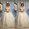 Sexig Vintage Arabisk Ball Gown Bröllop Klänningar Juvel Långärmad Illusion Lace Applique Crystal Beaded Plus Size Formella Brudklänningar