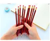 30 pcs / lote Lápices de madera de color rojo Shanghai lápices HB con borrador de papelería Mirui con cubo de almacenamiento