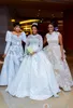 Niesamowite arabskie Aso ebi luksusowe koronkowe seksowne sukienki ślubne Kryształy Kryzysowe długie rękawy sukienki ślubne Sheer Szyja Weddin287c