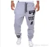 Erkek pantolonlar erkek beyaz gri elastik bel baskılı harfler gevşek gündelik harem baggy hip hop dans spor pantolon pantolon s210m
