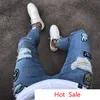 Men Hot Ripped Jeans Knee Holes Draped Long Pencil Pants Zippers Design Male Long Trousers