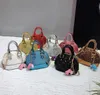 30PCS الاطفال المحافظ فتاة PU الترتر شل على شكل سلسلة الصغيرة CROSSBODY حقيبة اللون ميكس