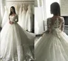 Abiti da sposa a maniche lunghe con scollo rotondo modesto 2019 corsetto Plus Size Abito da ballo in pizzo Abiti da sposa su misura Dubai Arabia Saudita