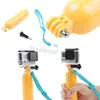 アクションカメラH9スポーツカメラのための黄色い浮遊ハンドグリップ親指のネジと調節可能なリストストラップSelfieスティック