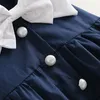 INS 뜨거운 나비 넥타이 어린이 부티크 의류 최고 품질로 어린이의 해군 치마 아기 소녀 귀여운 여름 드레스 판매
