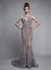 Qatar 2024 Luxury Berta Mermaid aftonklänningar Backless Beads Trumpet Prom Gowns ärmlösa Crystal paljetter Sexig illusion Party Dresses HY382