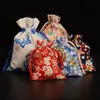 Nuevo Vintage étnico pequeño cordón bolsa grúa flor de cerezo joyería regalo bolsa Navidad boda fiesta Favor bolsa 8x10 cm 5 unids/lote