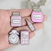 Simpatico cartone animato bottiglia sveglia rosa metallo Kawaii smalto spilla bottoni spilla camicia giacca di jeans borsa spille decorative per donne ragazze