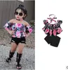 Ropa para niños Conjuntos de ropa de boutique de verano para bebés Niñas con hombros descubiertos Pantalones vaqueros rasgados Trajes Camiseta de encaje floral Pantalones cortos Trajes CALIENTE A5547