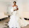 Afrikanska sjöjungfru bröllopsklänningar spaghetti crystal cascading ruffles svep tåg applikationer bröllopsklänning brudklänningar vestidos de novia
