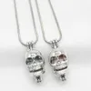 10 sztuk Silver Skull Head Pearl Klatka Biżuteria Dokonywanie Charms Essential Oil Dyfuzor Koralik Klatka Medalion Wisiorki Do Naszyjnik Perfum