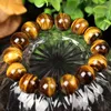 Högkvalitativ 6mm 8mm 10mm Tigers Eye Stone Bead Armband Män Kvinnor Naturliga ädelsten Staplable Armband Smycken Partihandel