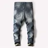 Marca de estilo chino bordado jeans masculinos salvaje pequeño agujero jeans plum estampado Pantalones cuatro temporadas bordados pantalones delgados de los hombres