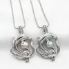 10st Silverpläterad Dolphin Pearl Cage Lockets Diffuser Cage Hängsmycke Halsband Smycken Charms för parfym eterisk olja