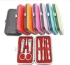 7 stuks nagelknipper kit schaar pincet mes oor pick utility manicure set gereedschap willekeurige kleuren