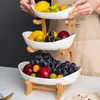Keramisk godisrätt vardagsrum hem tre lager fruktplatta mellanmål tallrik kreativ modern torkad frukt frukt korg