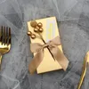 Golden Candy Box med båge bröllopsartiklar som åtföljer gåvor rektangulär godis kartong bröllop förpackning box diy dekoration