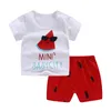 Neonato neonato Bambini Neonate Vestiti senza maniche Pagliaccetto in cotone tuta Outfit 2 pezzi / set Top e pantaloni Baby Boy vestiti