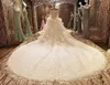 Eleganckie ślubne suknie ślubne z Peplum Ball Suknie z długimi rękawami Suknie ślubne z pociągiem