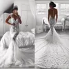 Eleganta sjöjungfru bröllopsklänningar illusion täckta knappar tillbaka spets applique kapell tåg skräddarsydda bröllopsklänning Vestido de novia