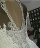 Abiti da sposa a sirena araba di lusso Dubai Perline Cristalli Corte dei treni Backless Plus Size Abiti da sposa Personalizzati