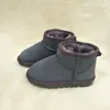 UGG Boots مصمم الأزياء النعال الشرائح الراتنج العظام الأرض البني الصحراء الرملية oringals النساء رجل أطفال إيفا عداء شاطئ النعال الصنادل