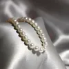 Gioielli classici eleganti Collana di perle di conchiglia da 6 mm di luce brillante da 90 cm Catena di coda in argento sterling 925 per donna