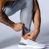 Pantaloni da jogging neri Pantaloni da uomo Pantaloni sportivi in cotone Pantaloni skinny casual Palestra maschile Allenamento fitness Autunno Abbigliamento sportivo da corsa