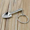 Gratis frakt av DHL Fashion Novelty Mini Shovel Keychain Metal Spade Key Rings för Promotion WB163