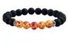 Pulseras de piedra volcánica natural Charm Mujeres Chakra Balance Beads Hombres Black Lava Turquoises Strand Bangle