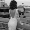 Nieuwe Liz Boheemian Martinez Mermaid -jurken Sheer Long Sleeve Lace Applique Bridal Dress Sexy V Neck Backless Boho trouwjurken