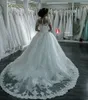 2019 Eleganti maniche lunghe Aline Abiti da sposa Girocollo velato Applicazioni in rilievo Perline Dubai Vestios De Novia Nuovi abiti da sposa wit4265220