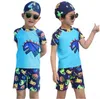 Dzieci stroje kąpielowe kąpielowe kostium kąpielowy wetsuit chłopcy kreskówka dinozaur pływanie czapki kąpielowe dziewczyny nurkowanie garnitur sceniczny swimwear swimwear surfwear b5697